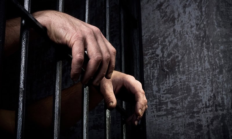 Police arrest man for posting drunken photos on Facebook