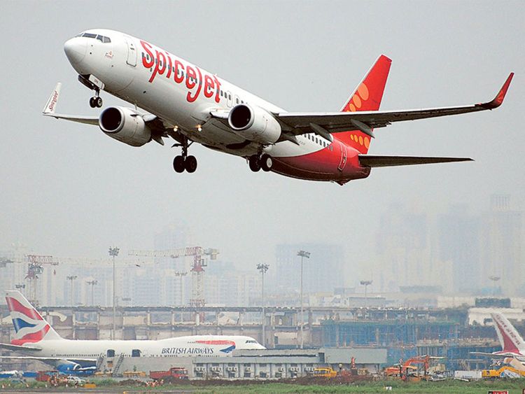 Passenger tries to open emergency exit mid-flight