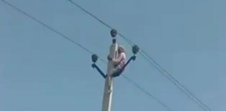 60-year-old man climbs electric pole after children object to second marriage