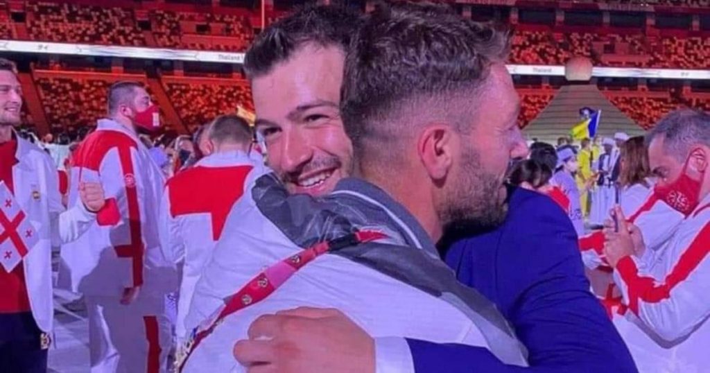 Two Syrian brothers hug while competing on opposing sides at Tokyo Olympics