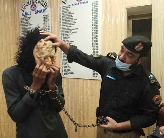 Police arrest Peshawar man for wearing scary mask