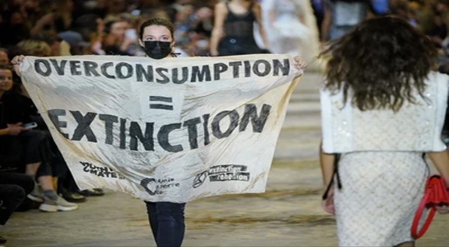 VIDEO: Climate change protester disrupts Louis Vuitton show in Paris