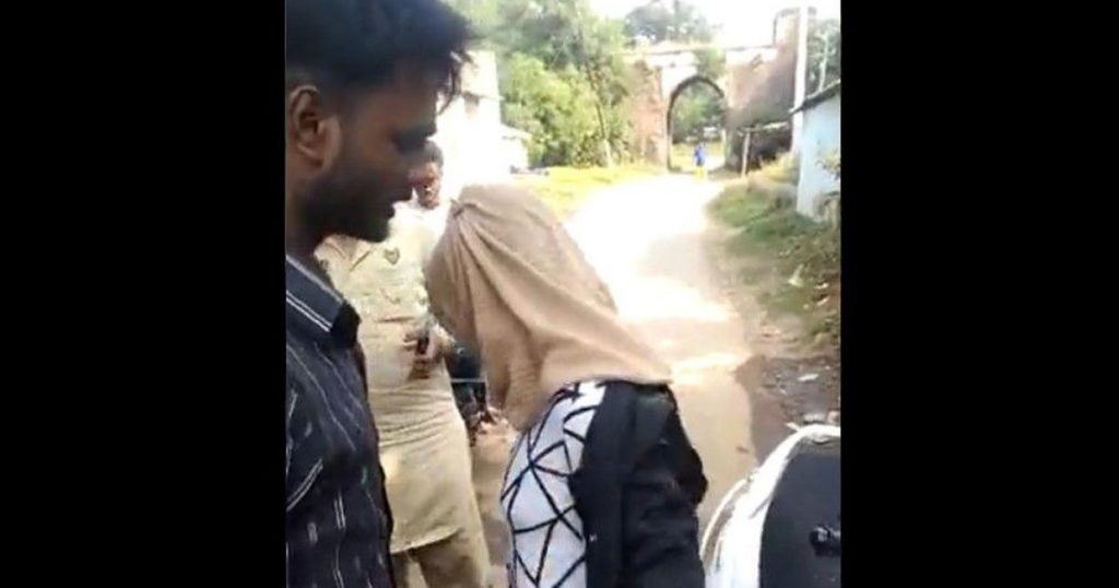 VIDEO: Muslim woman in India forced to remove burqa in public