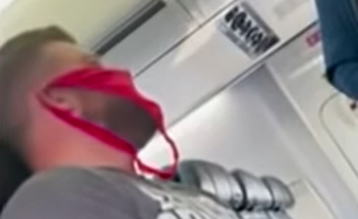 Video: Man kicked off from flight for wearing women’s underwear as face mask
