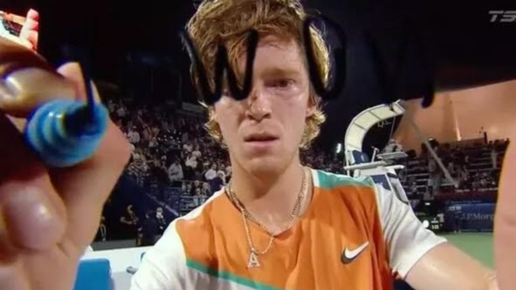 Russian tennis player Andrey Rublev writes 'No War Please' on camera after Dubai win