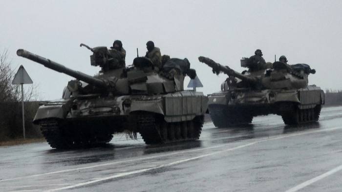 Ukrainian President imposes martial law as Putin declares war