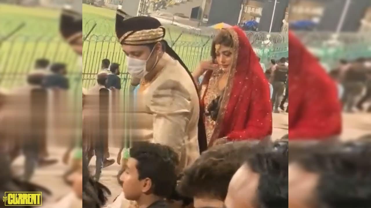 Bride and groom leave their wedding ceremony to meet Babar Azam