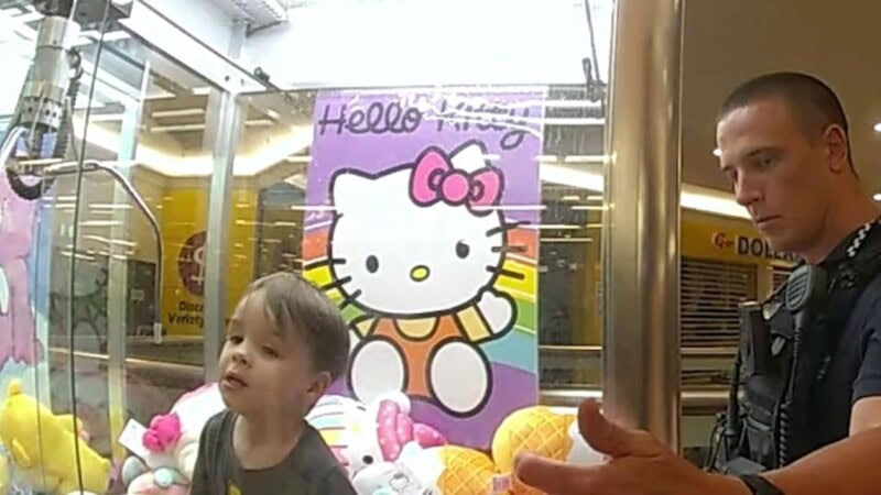 Watch: Child trapped in toy claw machine enjoying himself before rescue