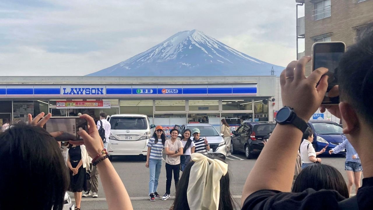 Japan town begins blocking Mt Fuji view from 'bad-mannered' tourists