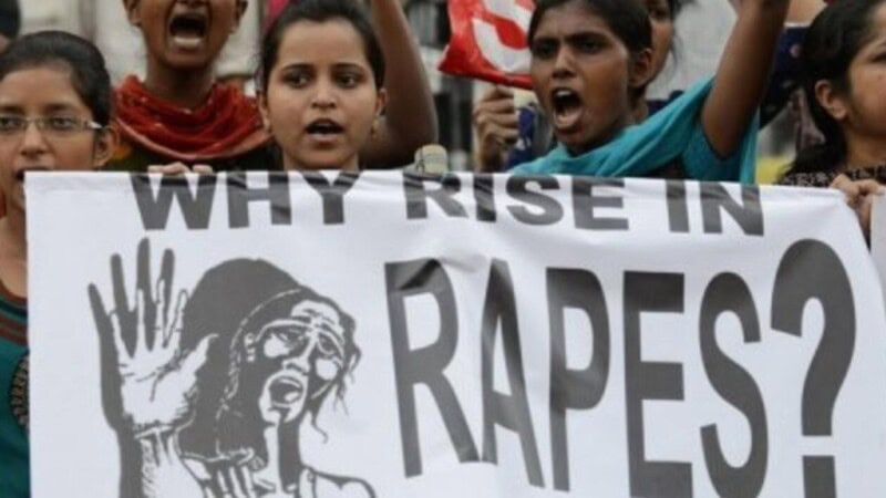 Bystanders watch and film woman get raped on footpath in India
