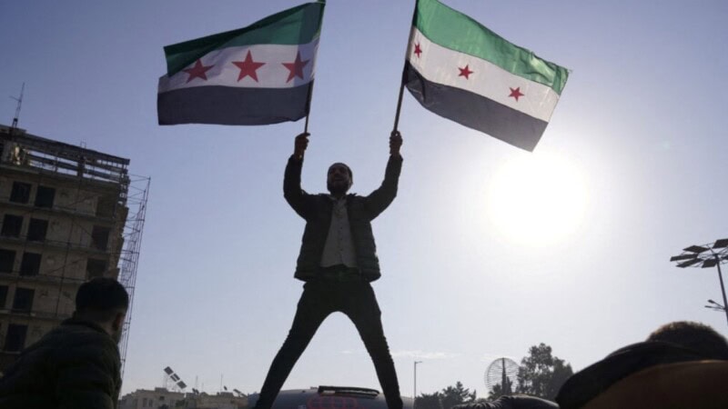 Syrians rejoice as opposition take over country, Assad flees to Moscow
