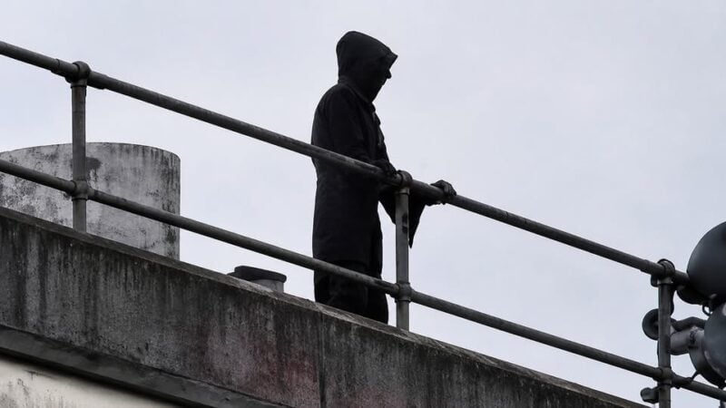 Man arrested for dressing up as Grim Reaper, staring at patients from hospital roof