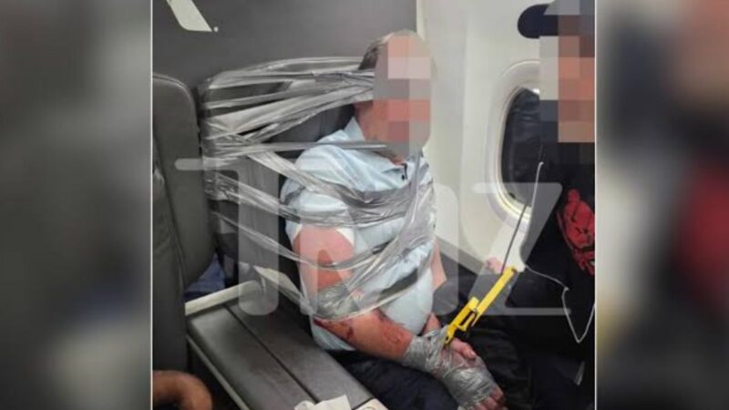 Man duct-taped to seat after hurling slurs, attacking passengers on flight
