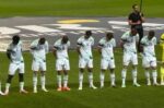 Irish players lower heads during Israeli anthem, wear black armbands, skip handshake at Nations League match